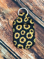 Sunflowers on Black Background Hand Sanitizer Holder