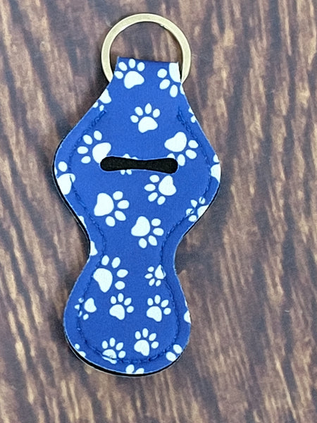 White Paws on Blue Background Chapstick Holder